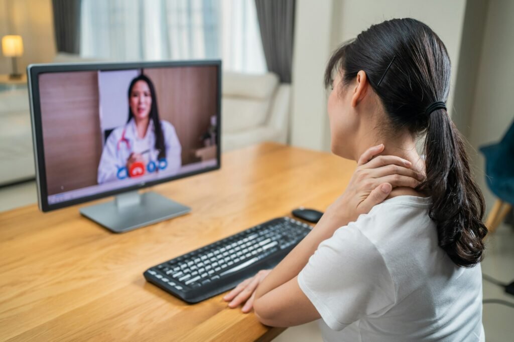 Asian woman consult with online doctor for medical healthcare in house.