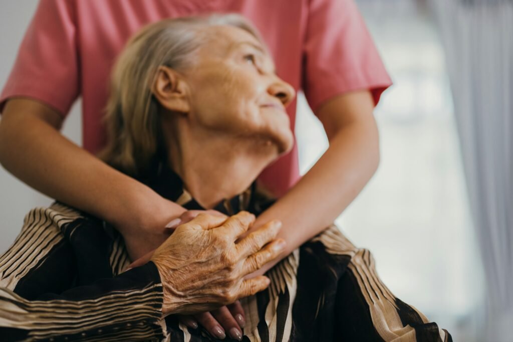 Senior patient with home care nurse, Happy senior woman talking with caregiver